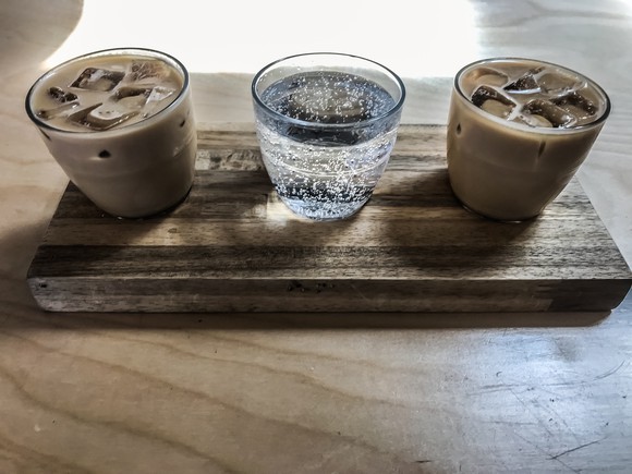 Three glasses of coffee and seltzer drinks