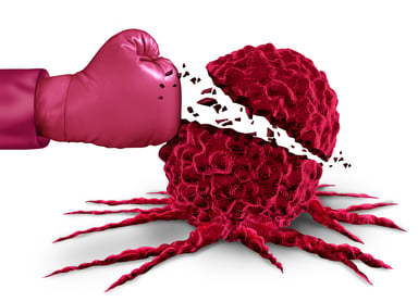 Boxing glove hitting cancer cell