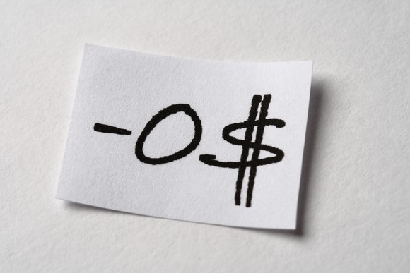 A piece of paper shows zero dollars owed.