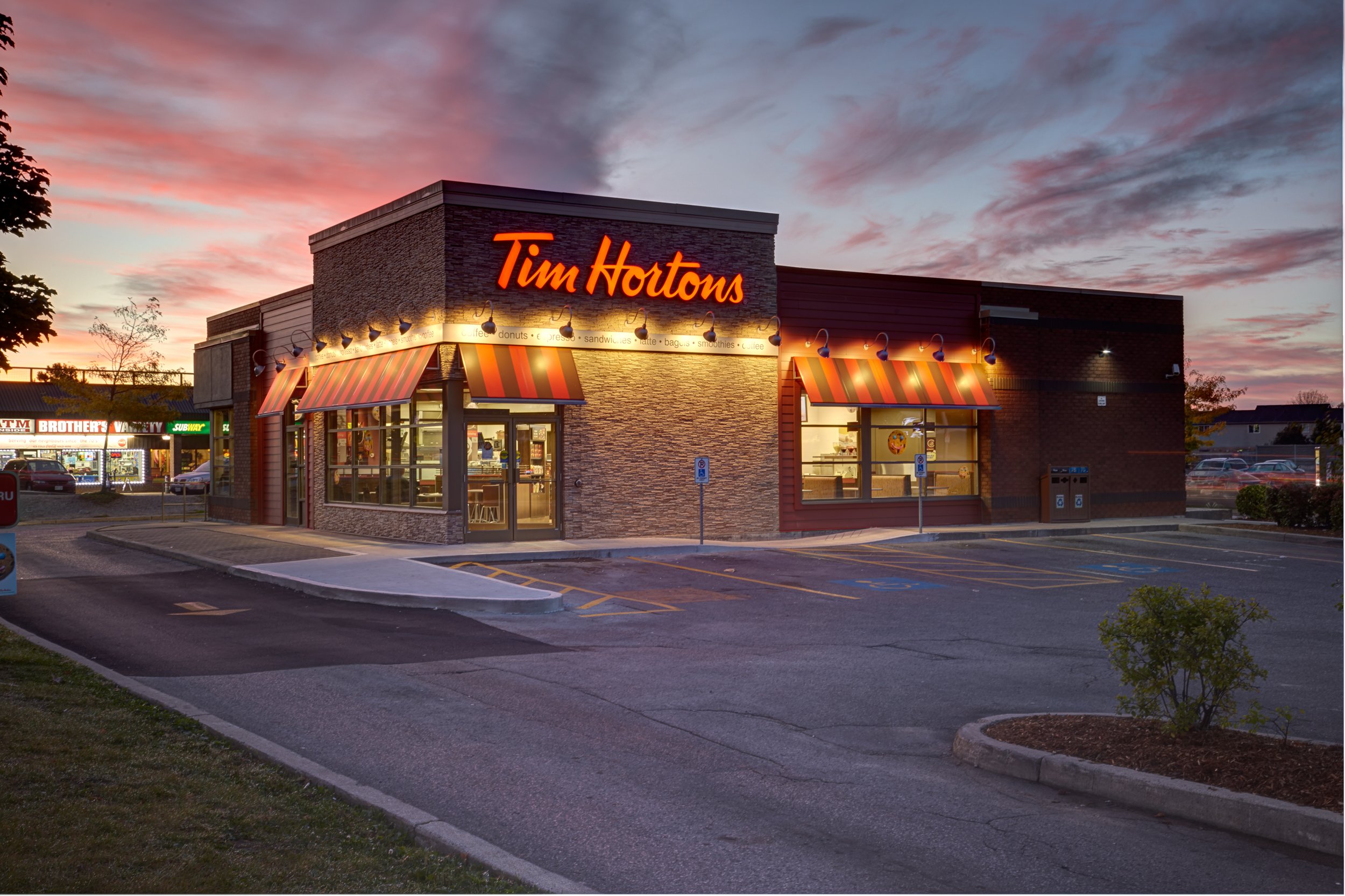 A Tim Hortons restaurant by dawn's early light.