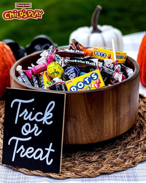 Bowl full of Tootsie Roll products.