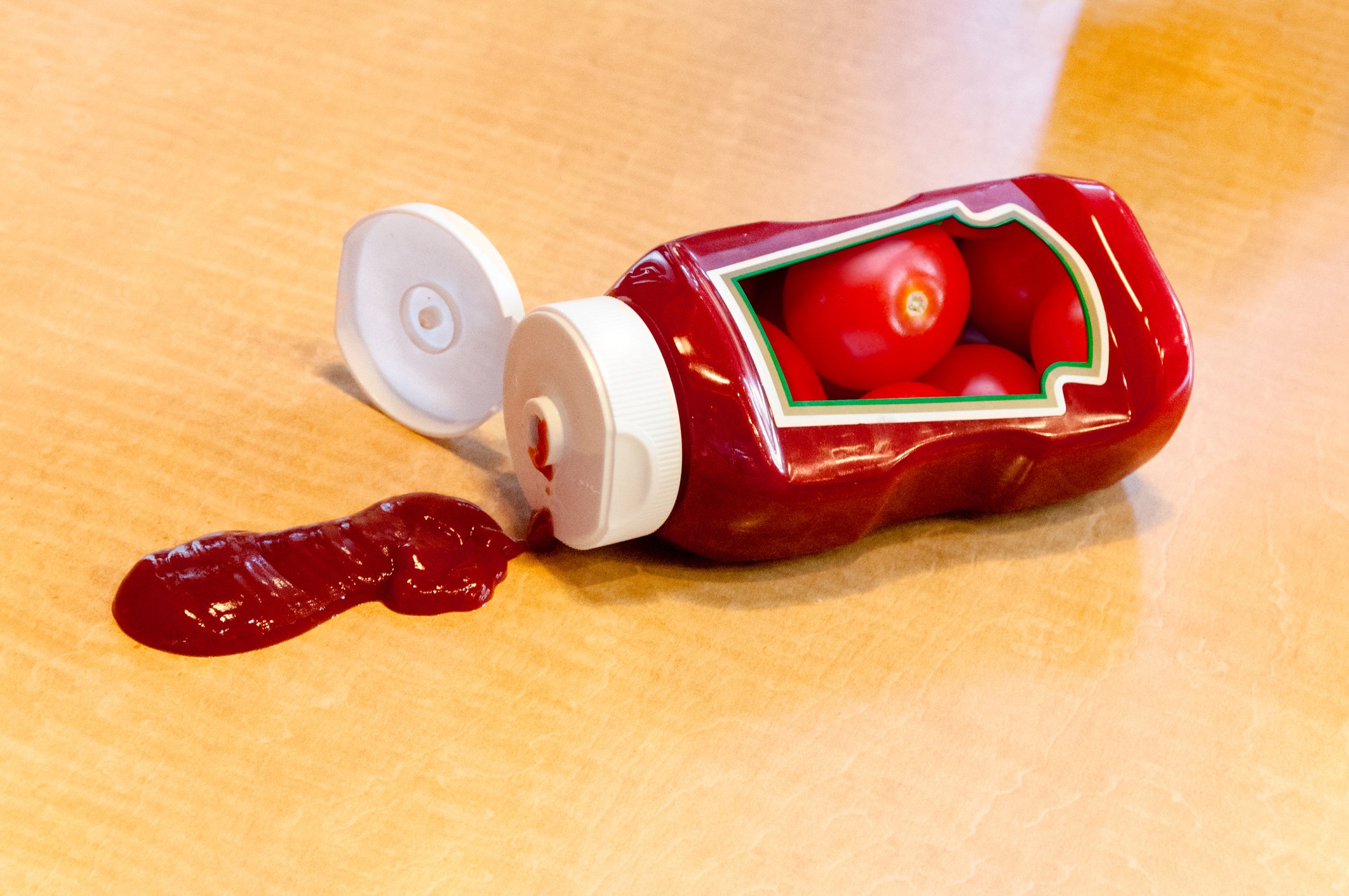 Open ketchup bottle on its side.