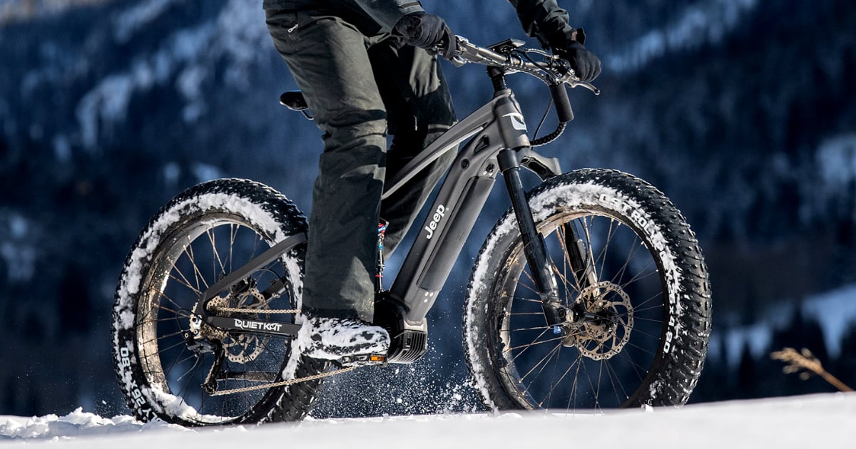 Rider on e-bike in the snow.