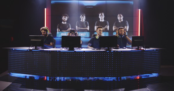 Esports players in front of gaming computers. 