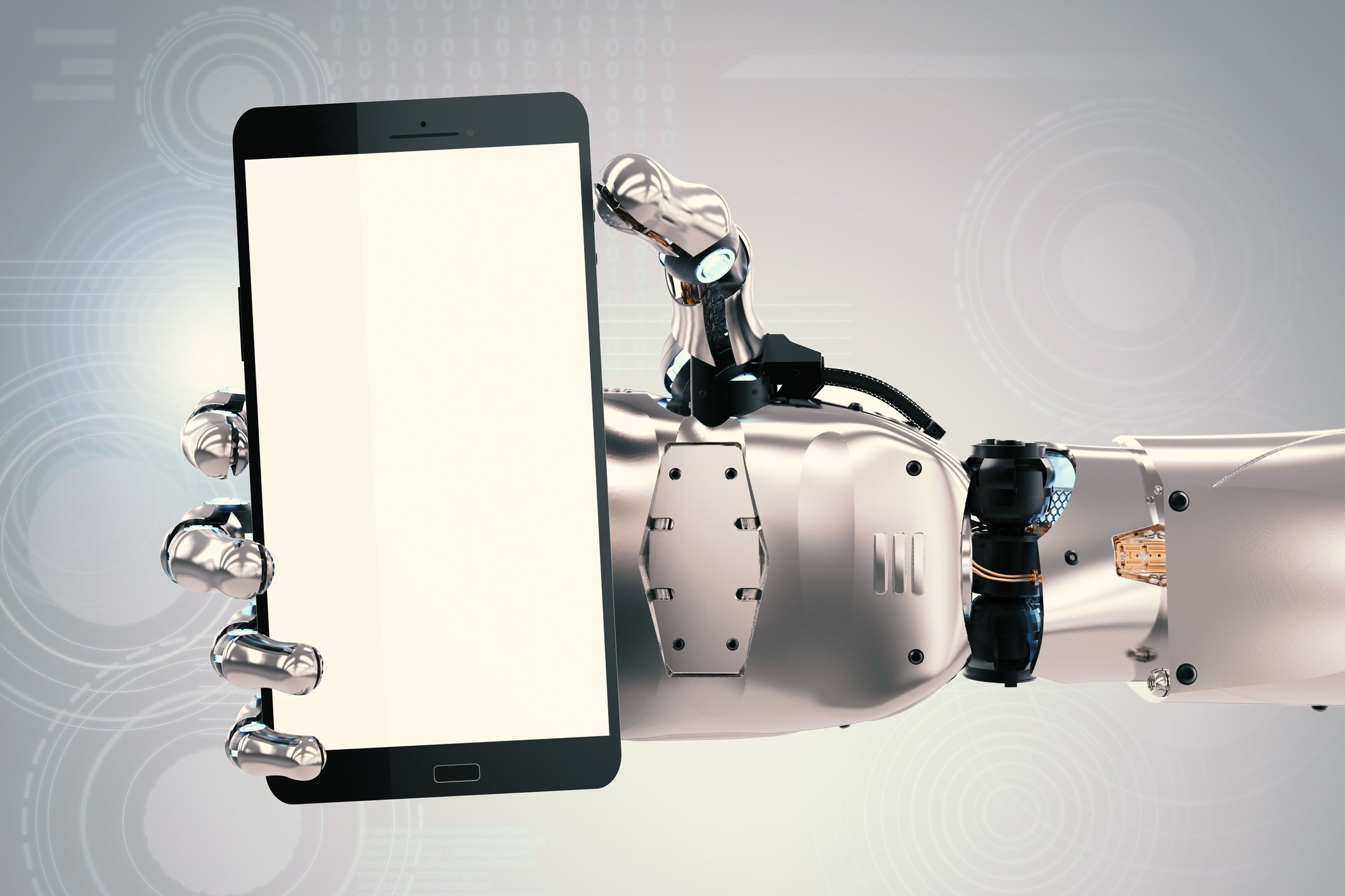 A robotic hand holds a smartphone.