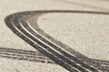 2 car tire skid marks on the road