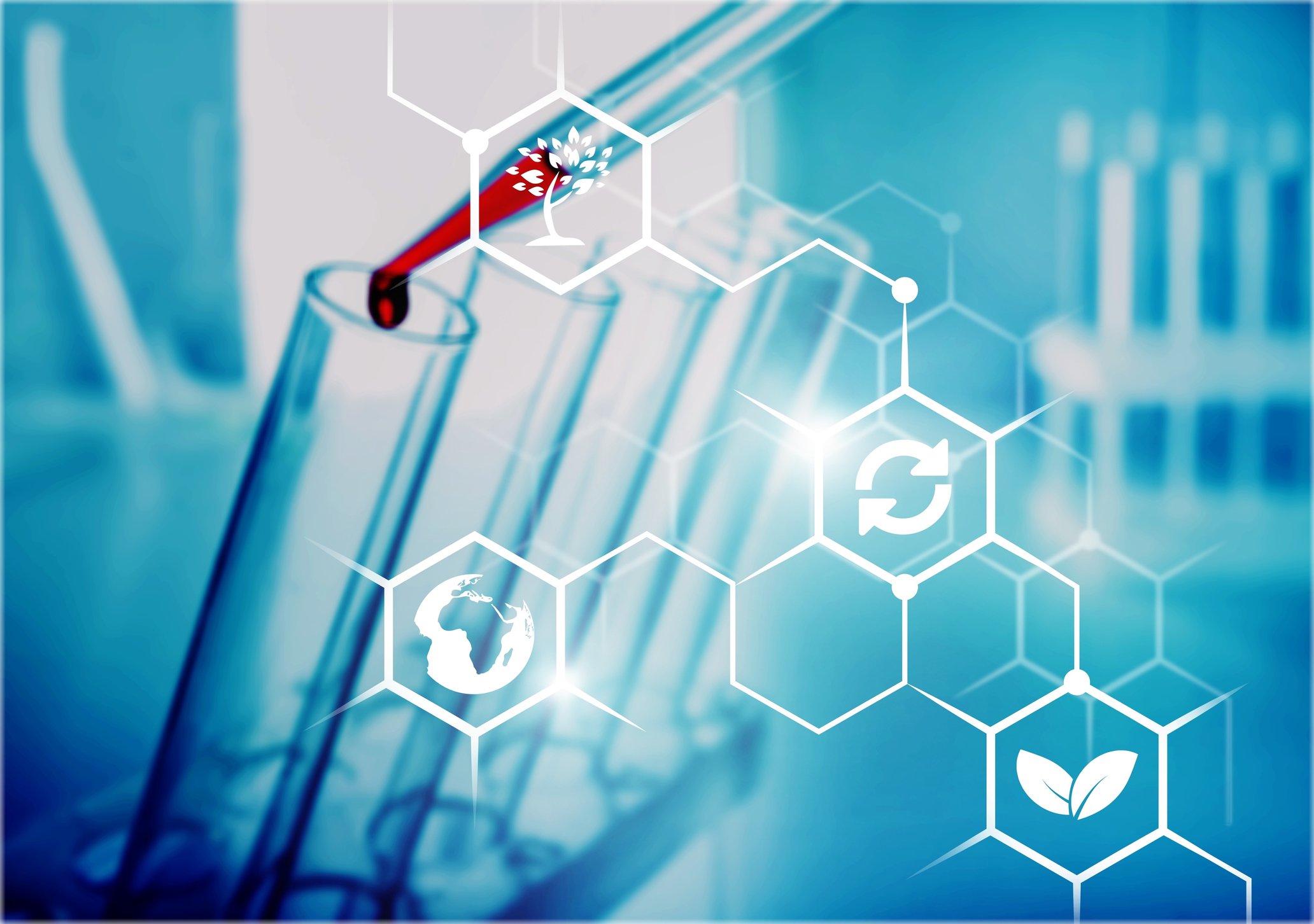 Pipepette dropping sample into a test tube.