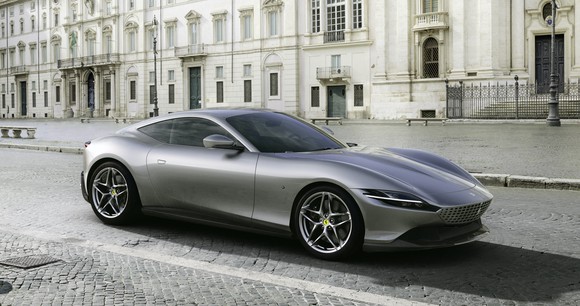 A silver Ferrari Roma, a sleek front-engined two-seat coupe. 