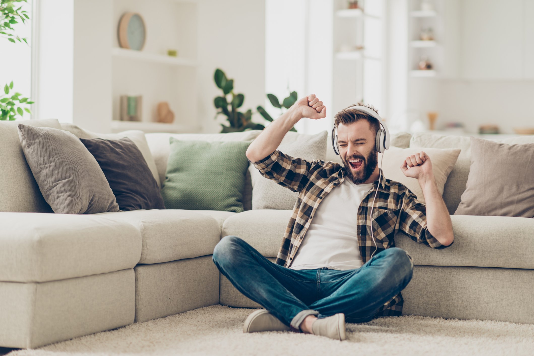 Man listening to music through headphones