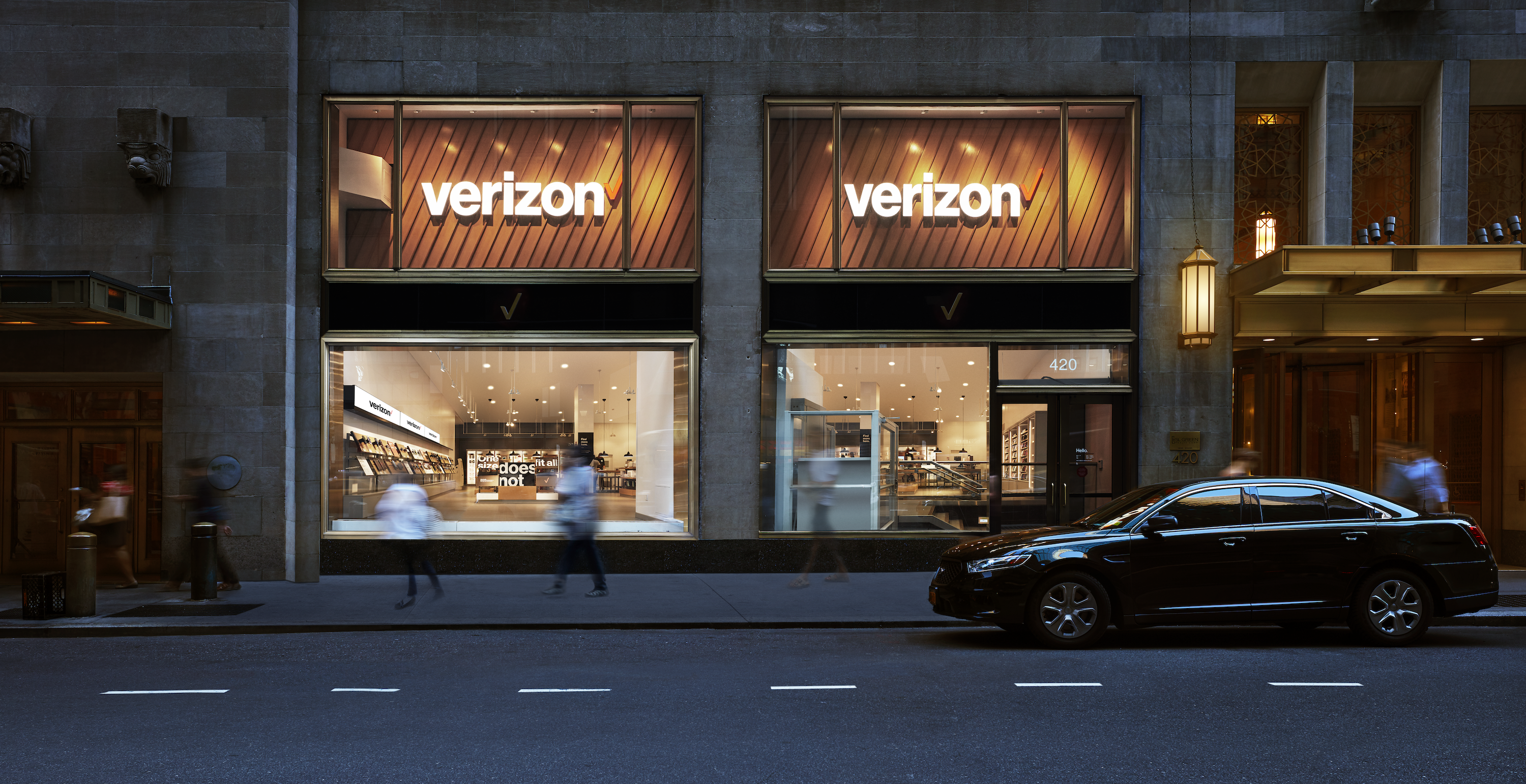 Exterior shot of a Verizon storefront at dusk
