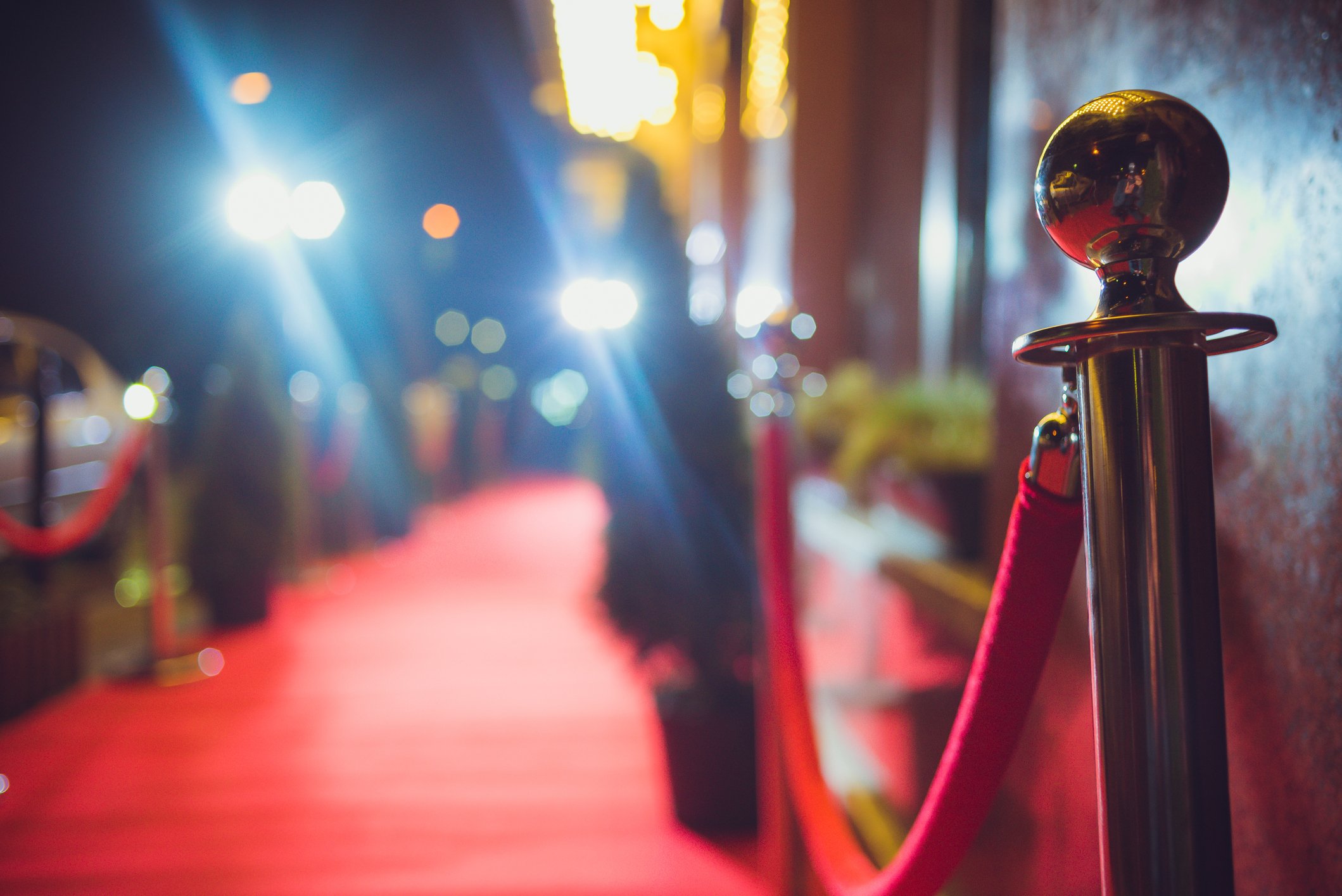 An empty red carpet with lights