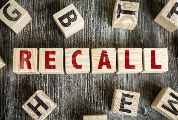 Letters on blocks spell the word recall.
