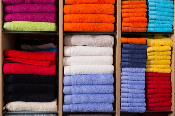 Retail shelf filled with towels