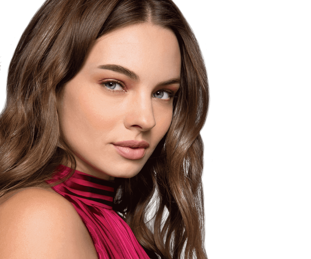 A model with plump lips looking into the camera.