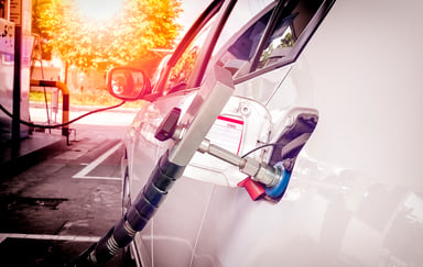 CNG Natural Gas fuel pump fueling a car