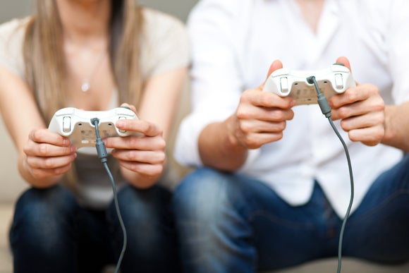 Video gamers play together on a console.