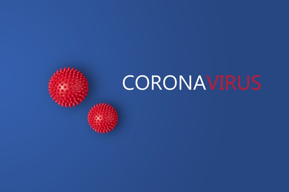 The word coronavirus displayed against a blue background, with two red balls with spikes that represent the virus set nearby.