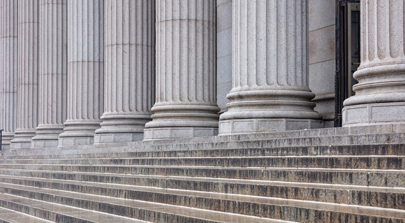 Steps leading to columns outside a bank.