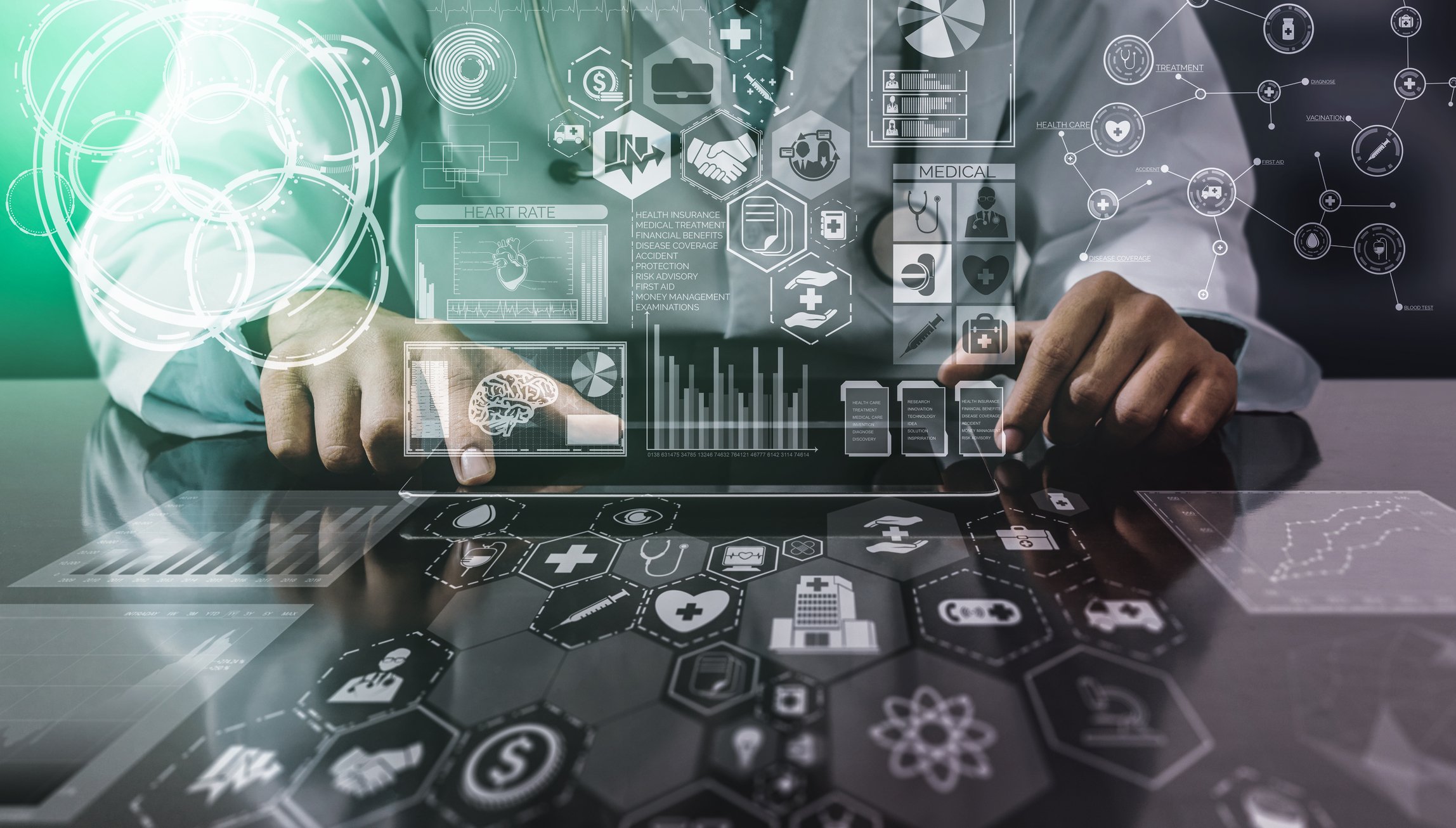 A person in lab coat using a heads up computer display showing symbols representing scientific ideas