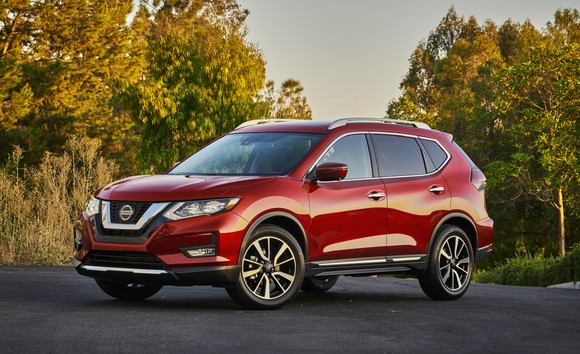 A red 2020 Nissan Rogue, a compact crossover SUV.