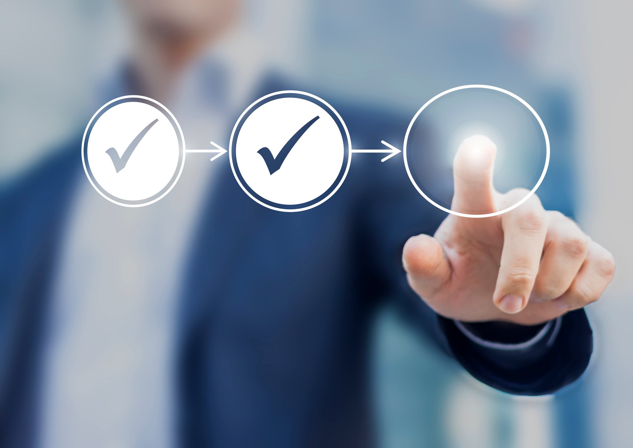 A person's finger checking virtual check boxes.