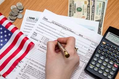 filling out tax return_GettyImages-511747280
