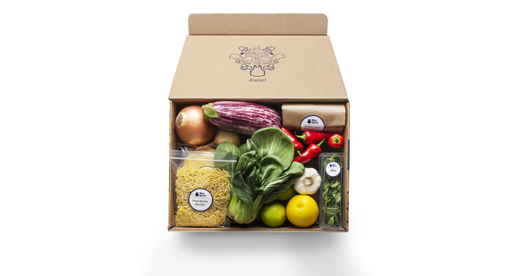 Blue Apron meal kit box filled with ingredients