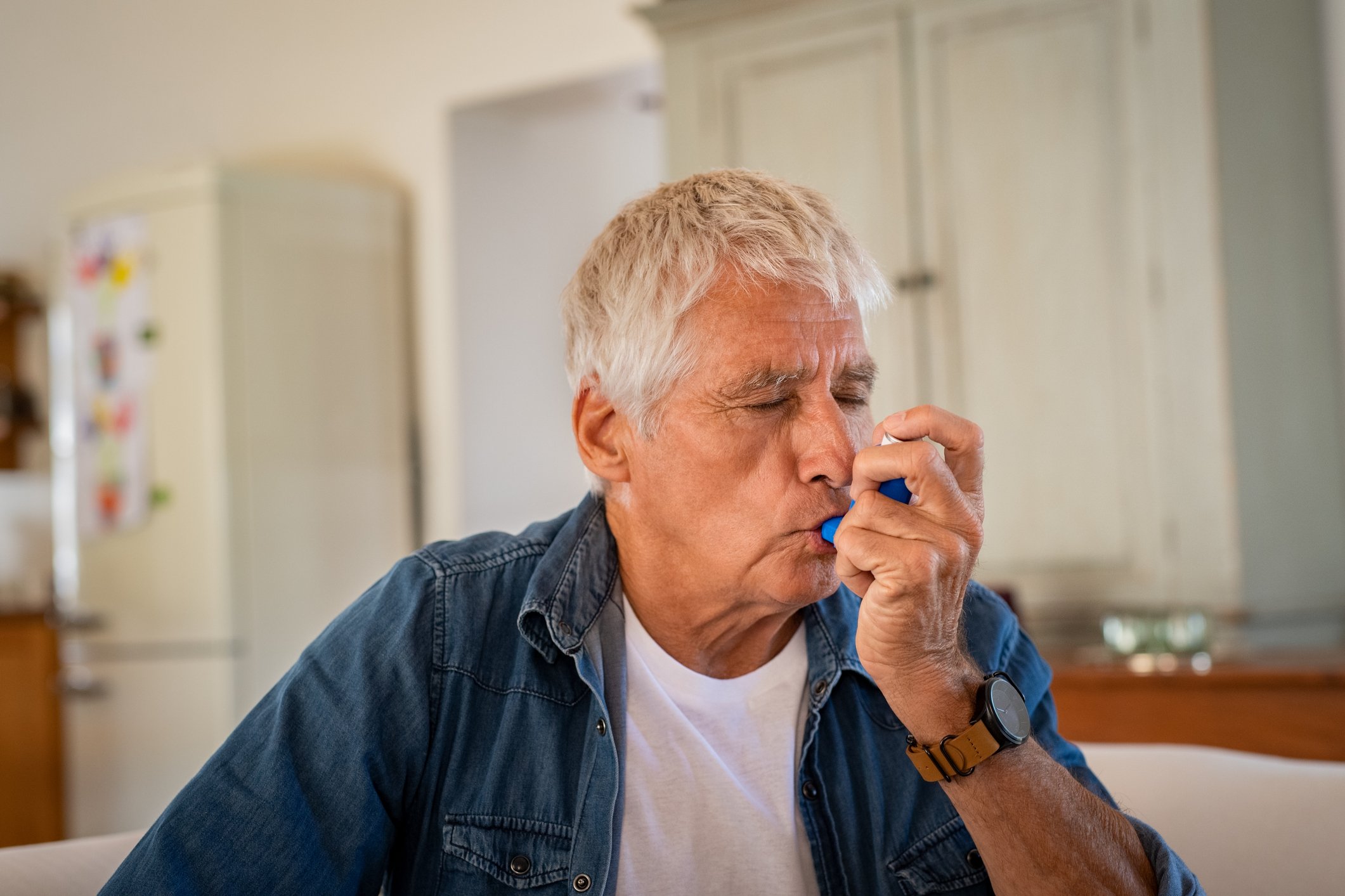 Patient using an inhaler