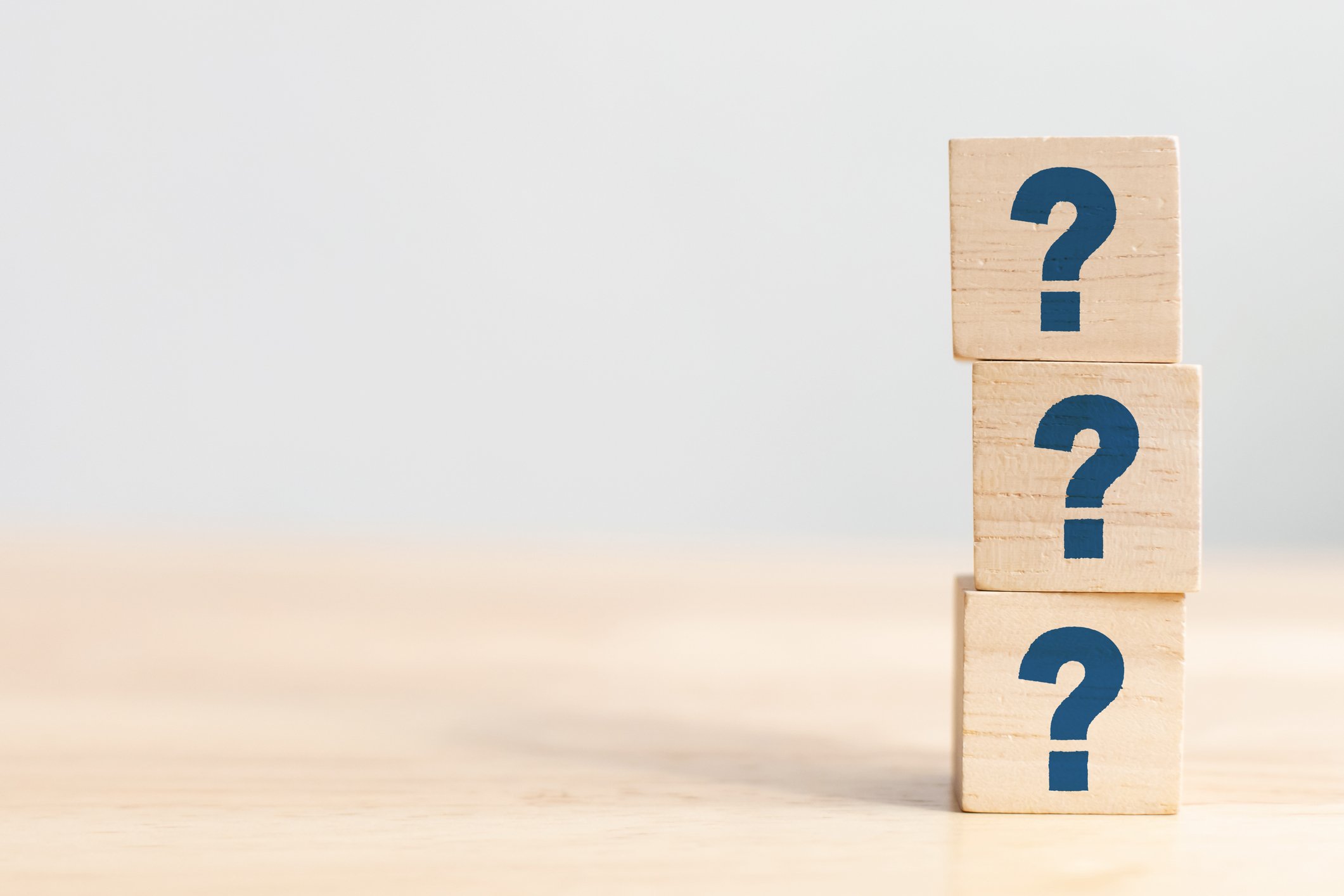 Stack of three blocks with a question mark on each.