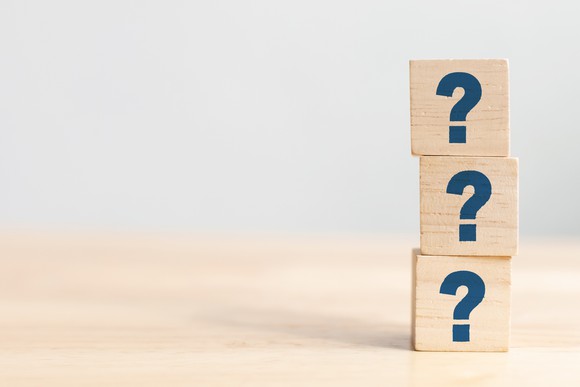 Stack of three blocks with a question mark on each.