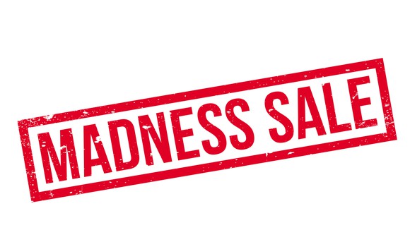 A red rubber stamp that says madness sale.