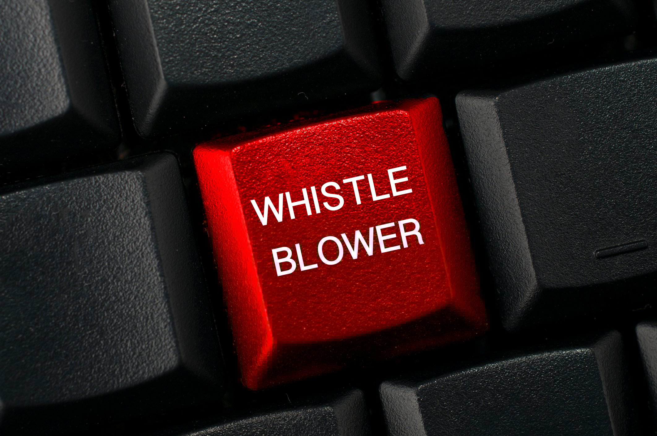 Computer key labeled whistleblower