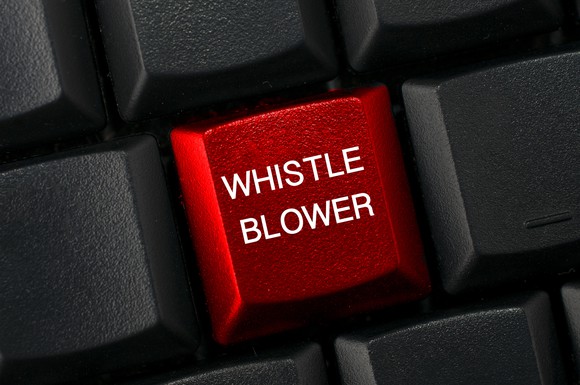 Computer key labeled whistleblower
