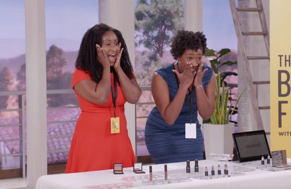 Two women selling makeup on TV