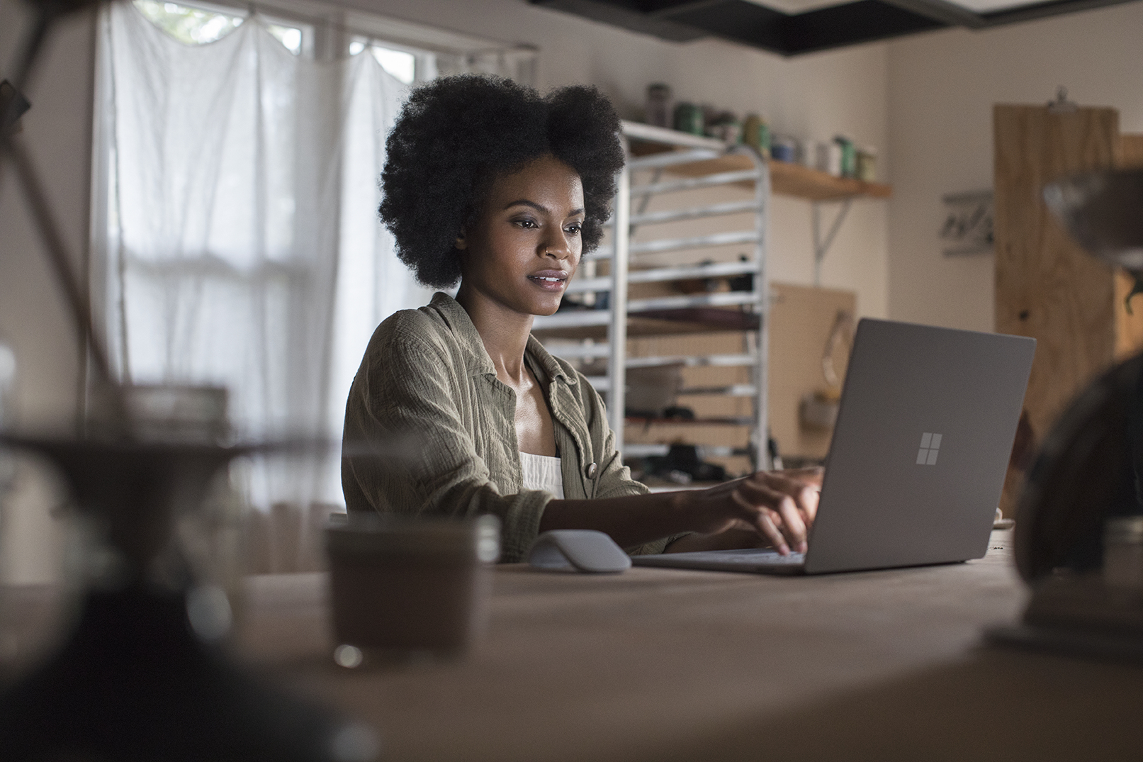 Woman using Surface Laptop