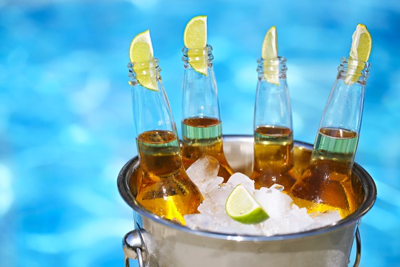 Bucket of beer bottles on ice