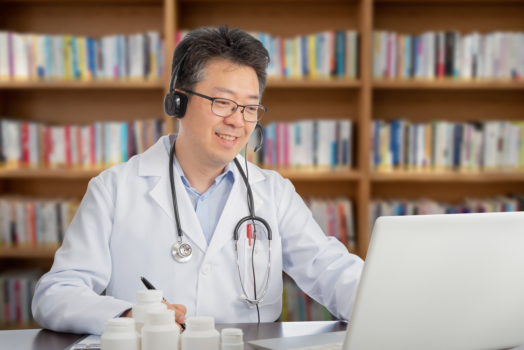 A doctor having a teleconference with a patient.