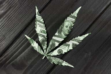 US currency in the shape of a marijuana leaf