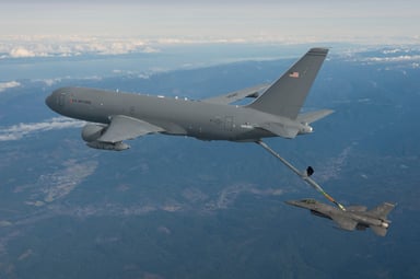 KC-46 tanker refueling an F-16 fighter IS Boeing