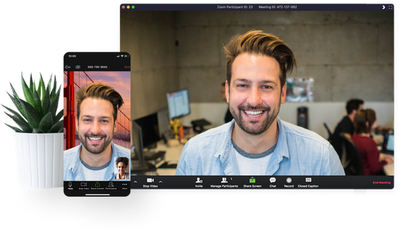 Image of a youngish casually dressed man on a computer screen and on a cell phone screen.