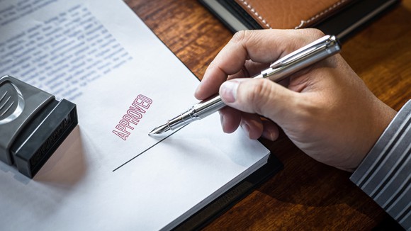 Approved stamped on paperwork