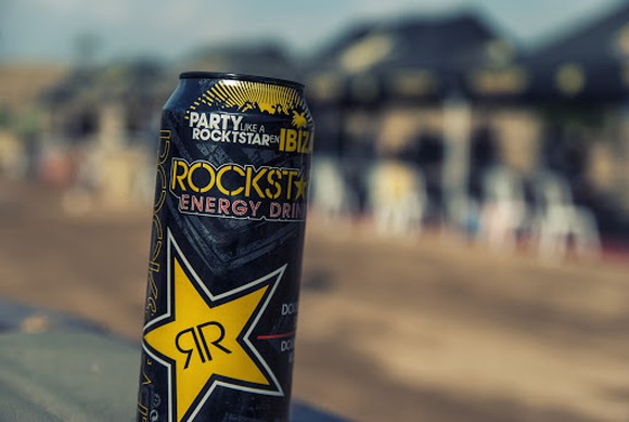 A Rockstar energy drink can. 
