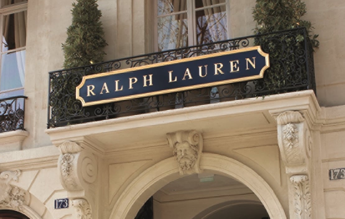 A close-up of the Ralph Lauren sign on the outside of the company's store in Paris.