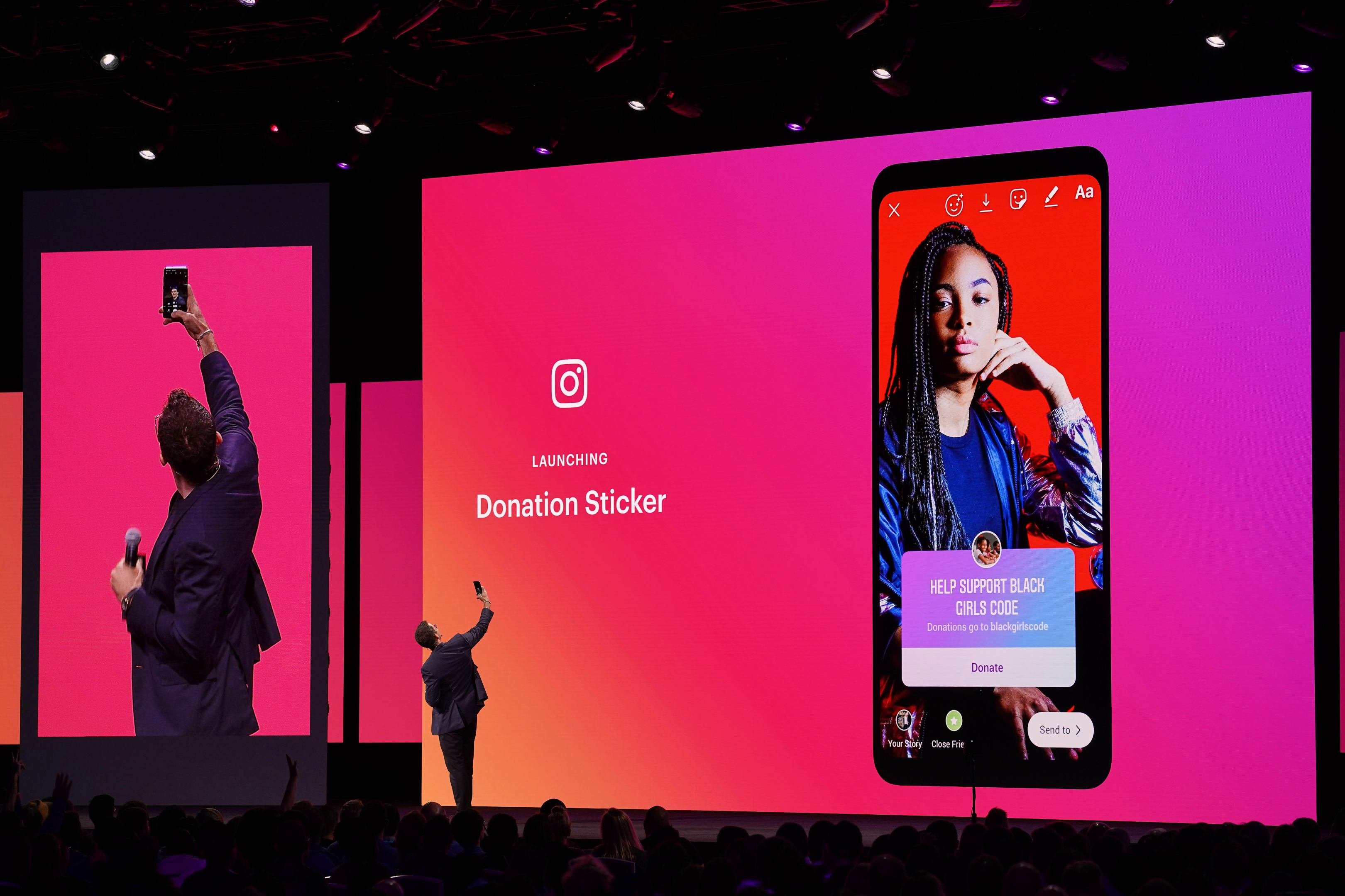 Facebook head Adam Mosseri on stage giving a presentation.