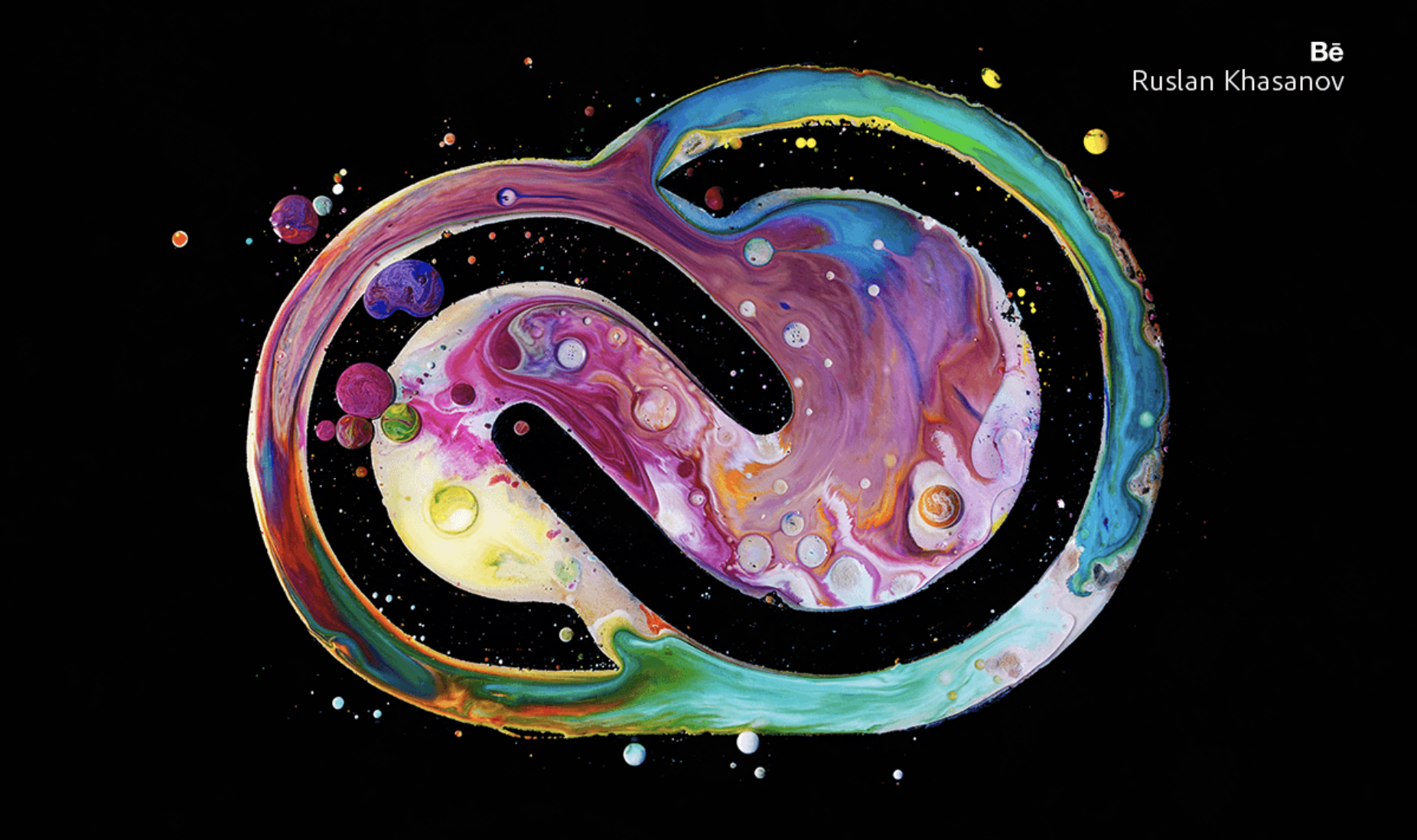 Adobe's Creative Cloud software logo rendered in multiple colors of paint