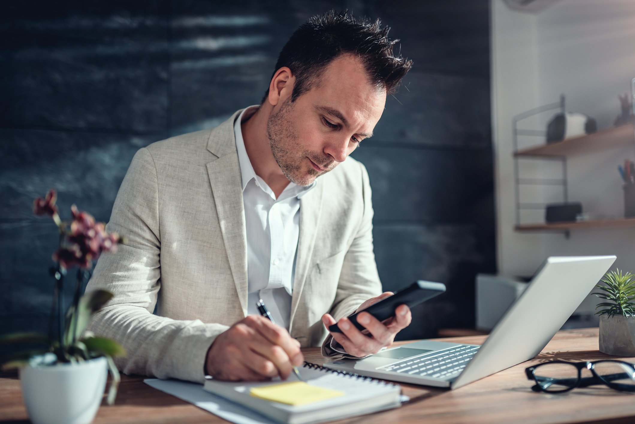 A businessperson working in his home office.