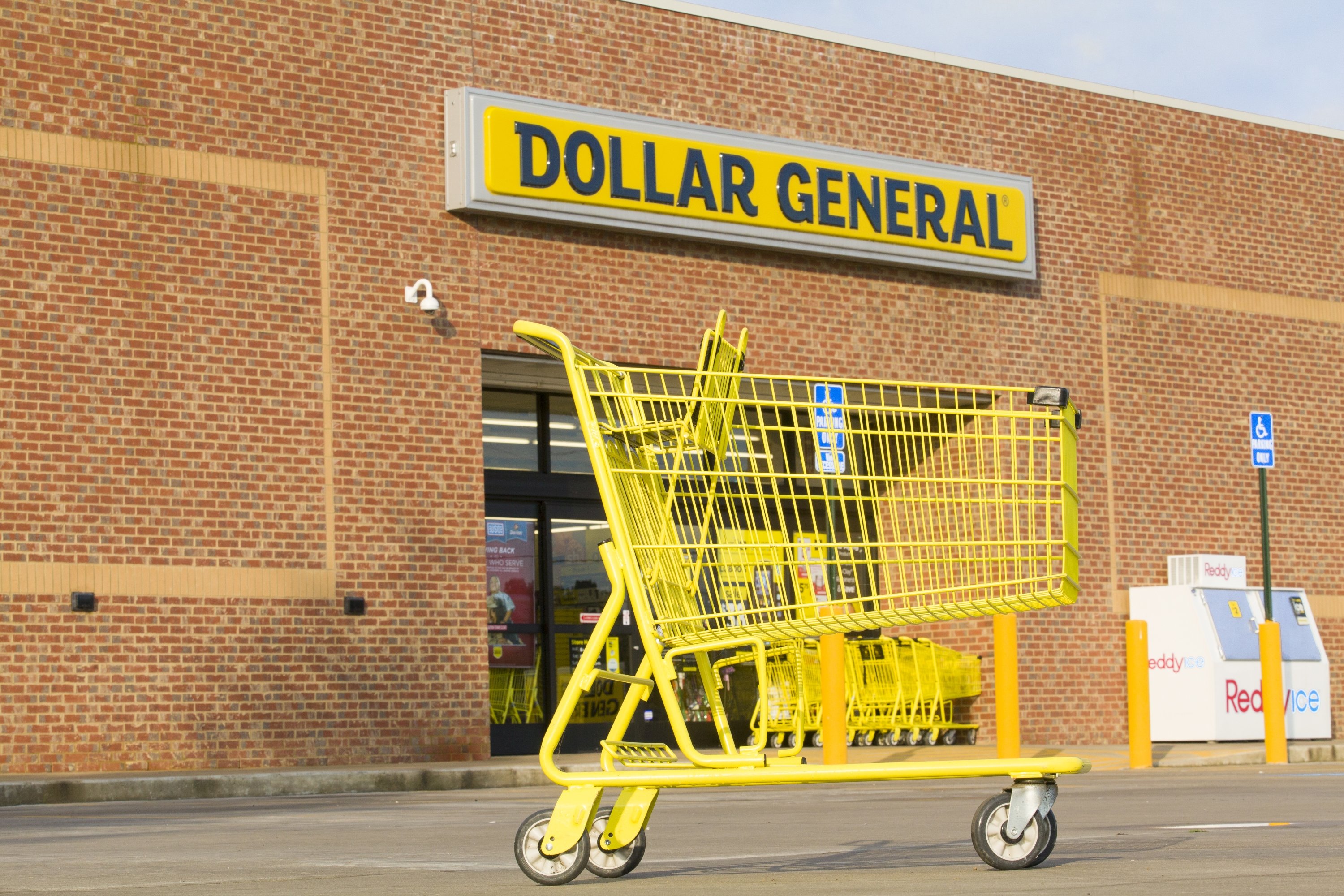 Dollar General exterior with a shopping cart.