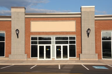 Empty Parking Lot and Storefront