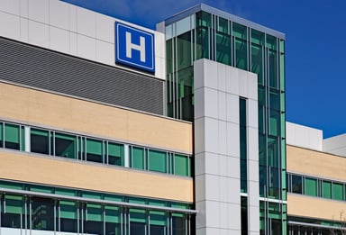 hospital building with h sign displayed
