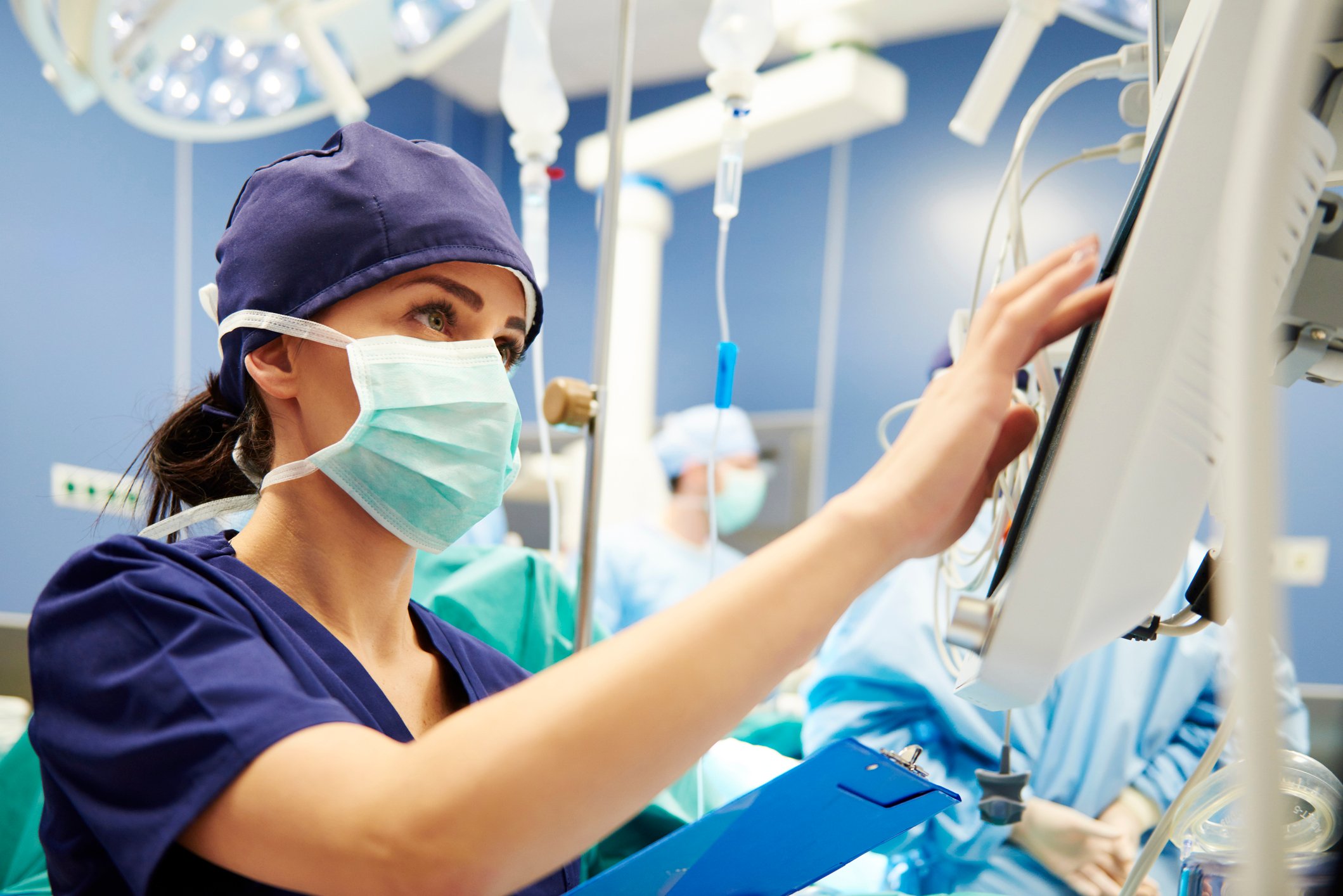 A nurse working in a hospital operating room.